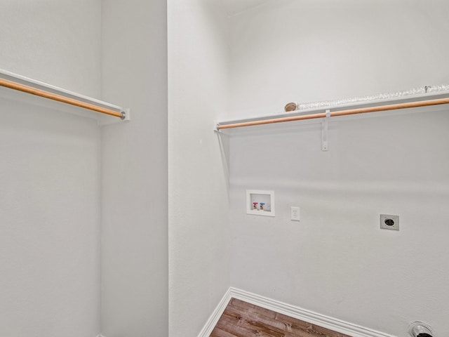 8705 Autumn Creek Trl, Fort Worth, TX 76134 - laundry area featuring hookup for an electric dryer, hookup for a washing machine, and wood finished floors