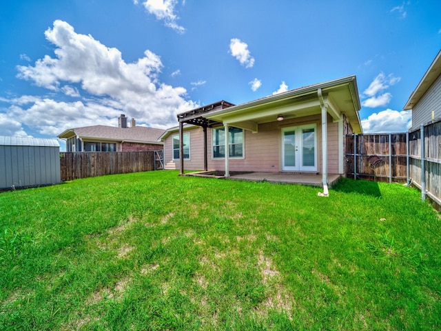 8705 Autumn Creek Trl, Fort Worth, TX 76134 - back of house featuring french doors, a fenced backyard, a shed, and a patio area
