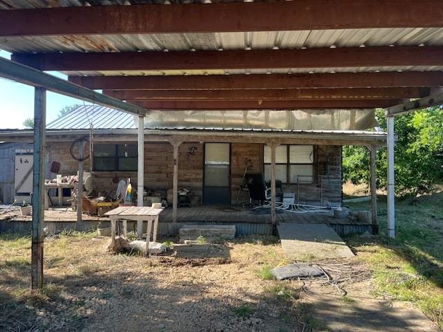 3315 County Road 188, Stephenville, TX 76401 - rear view of property with a metal roof