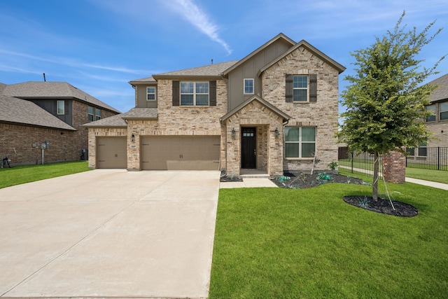 2819 Grand Lookout Ln, Arlington, TX 76001 - traditional home featuring driveway and a garage