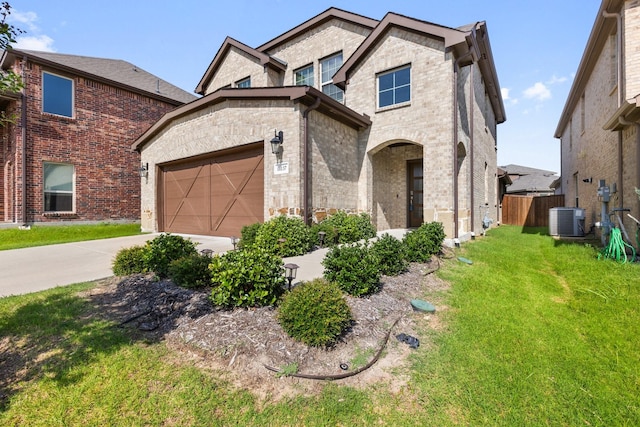 18137 Lakefront Ct, Forney, TX 75126 - view of front of house with an attached garage, driveway, and brick siding