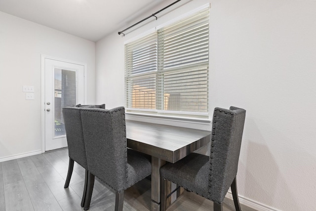 18137 Lakefront Ct, Forney, TX 75126 - dining room with baseboards and wood finished floors