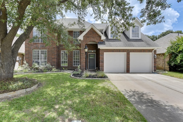 6111 Pinwood Cir, Arlington, TX 76001 - view of front of property featuring an attached garage, driveway, brick siding, a front yard, and roof with shingles