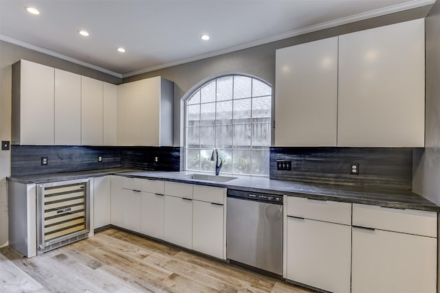 6111 Pinwood Cir, Arlington, TX 76001 - kitchen featuring stainless steel dishwasher, wine cooler, crown molding, recessed lighting, and tasteful backsplash