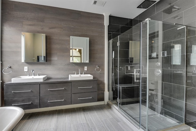 6111 Pinwood Cir, Arlington, TX 76001 - full bathroom featuring double vanity and a stall shower