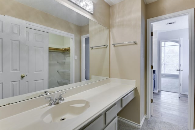 6111 Pinwood Cir, Arlington, TX 76001 - bathroom with vanity and baseboards