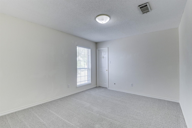 6111 Pinwood Cir, Arlington, TX 76001 - carpeted empty room with a textured ceiling and baseboards