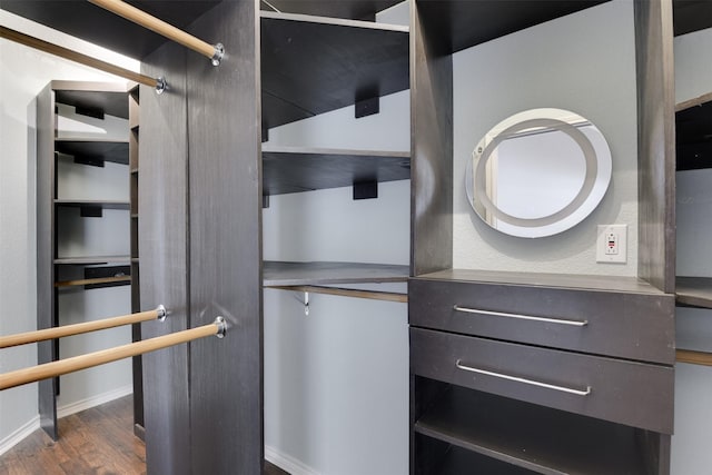 6111 Pinwood Cir, Arlington, TX 76001 - spacious closet featuring dark wood-type flooring