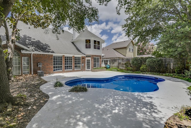 6111 Pinwood Cir, Arlington, TX 76001 - view of swimming pool with a patio and a fenced backyard
