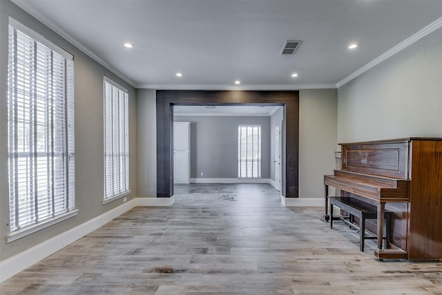 6111 Pinwood Cir, Arlington, TX 76001 - foyer entrance with crown molding, recessed lighting, and light wood-style floors
