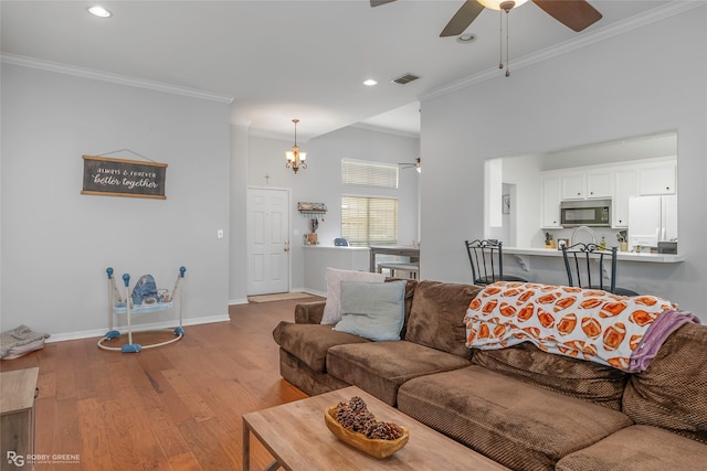 118 Otto Ln, Shreveport, LA 71105 - living area featuring crown molding, a ceiling fan, wood finished floors, and recessed lighting