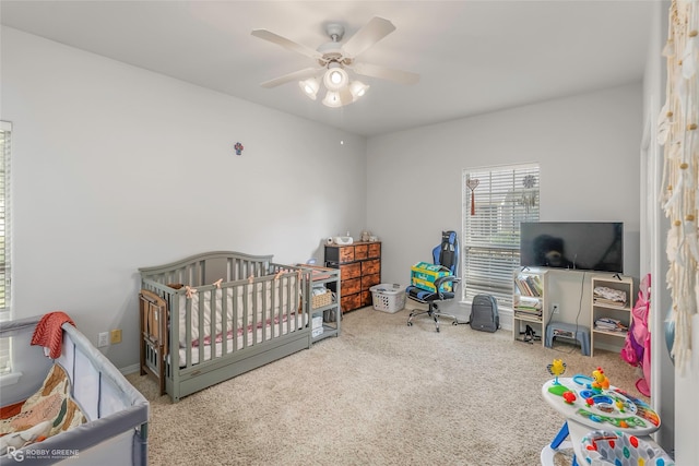 118 Otto Ln, Shreveport, LA 71105 - bedroom with carpet floors, a nursery area, and ceiling fan