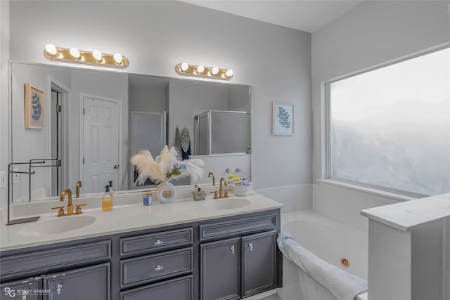 118 Otto Ln, Shreveport, LA 71105 - full bath featuring double vanity, a tub with jets, and a stall shower