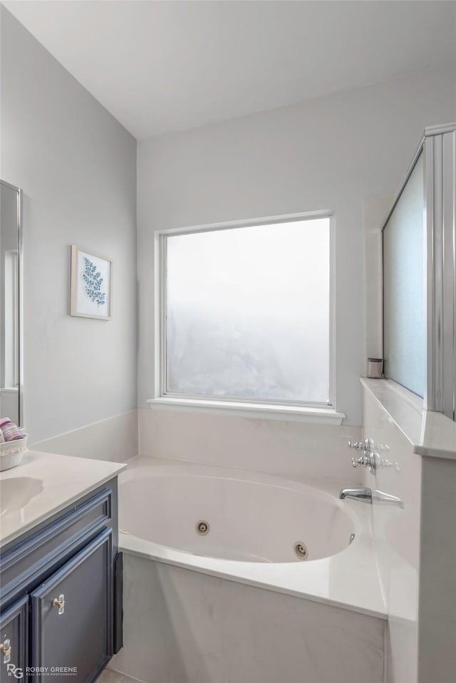 118 Otto Ln, Shreveport, LA 71105 - full bathroom featuring a tub with jets and vanity