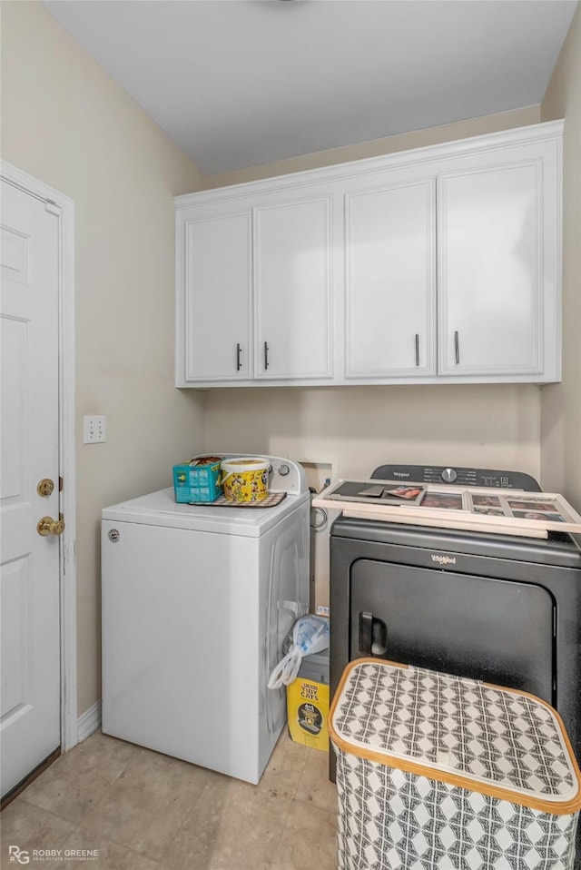 118 Otto Ln, Shreveport, LA 71105 - washroom with washing machine and clothes dryer and cabinet space