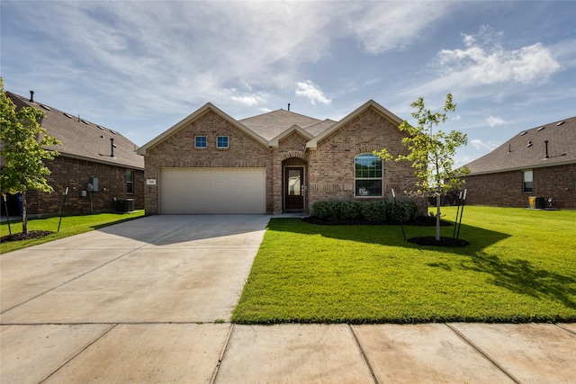 204 Post Oak St, Azle, TX 76020 - traditional home with driveway, brick siding, a front lawn, and a garage