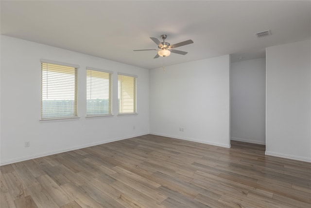 204 Post Oak St, Azle, TX 76020 - unfurnished room featuring a ceiling fan and light wood-type flooring
