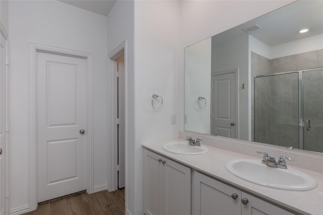 204 Post Oak St, Azle, TX 76020 - full bath with a stall shower, double vanity, and wood finished floors
