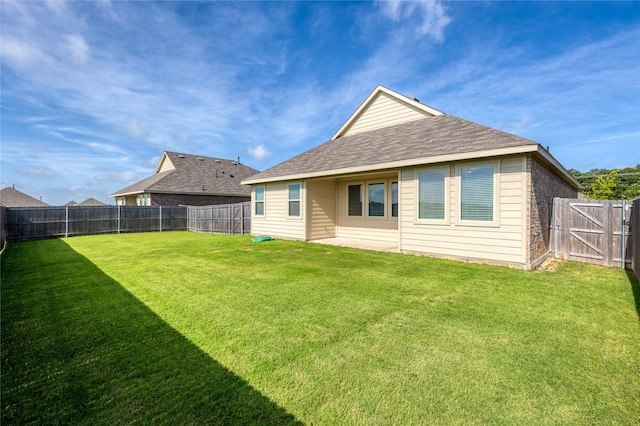 204 Post Oak St, Azle, TX 76020 - rear view of house featuring a fenced backyard, a gate, and roof with shingles