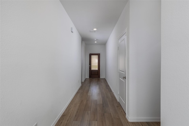 204 Post Oak St, Azle, TX 76020 - corridor featuring wood finished floors and baseboards