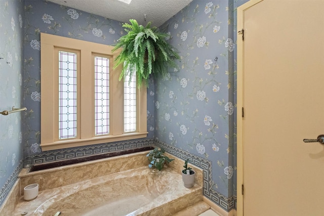 1605 Lamberth Cir, Sherman, TX 75092 - bathroom with a garden tub and a textured ceiling