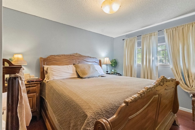 1605 Lamberth Cir, Sherman, TX 75092 - bedroom with a textured ceiling and wood finished floors