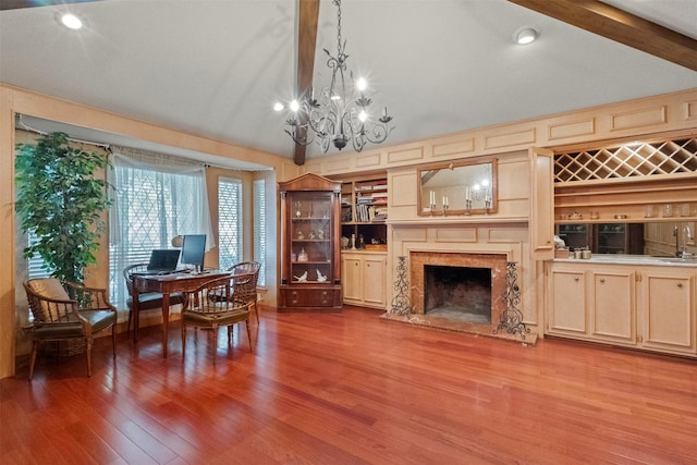 1605 Lamberth Cir, Sherman, TX 75092 - living room with a fireplace, a desk, wood finished floors, a chandelier, and recessed lighting