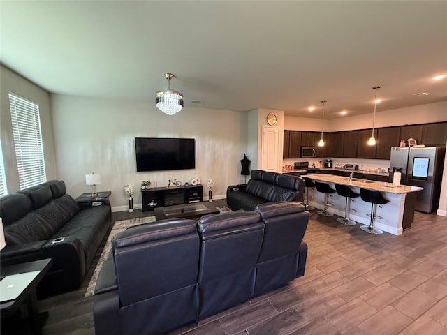 1124 El Sol Blvd, Sherman, TX 75090 - living area featuring baseboards and recessed lighting