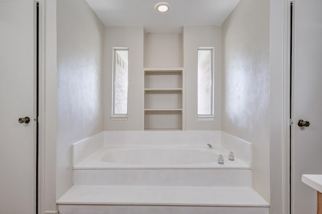 7305 Ridgeview Dr, Rowlett, TX 75089 - full bath featuring plenty of natural light and a bath