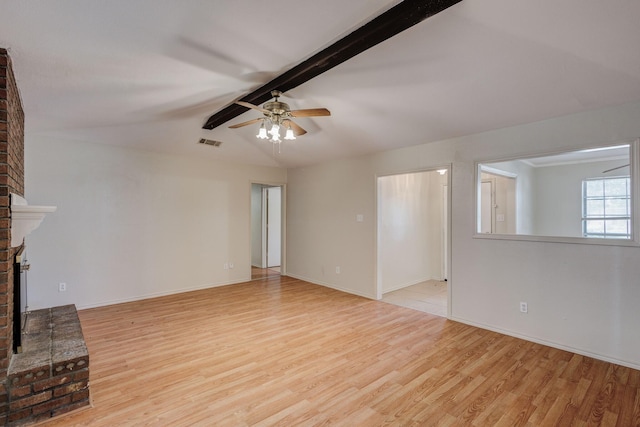 7305 Ridgeview Dr, Rowlett, TX 75089 - unfurnished living room with ceiling fan, wood finished floors, and a fireplace
