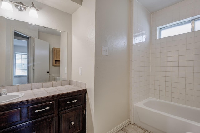 7305 Ridgeview Dr, Rowlett, TX 75089 - bathroom featuring vanity, tile patterned floors, and  shower combination