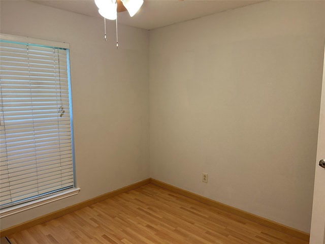 216 Lemon Dr, Arlington, TX 76018 - empty room with light wood finished floors and a ceiling fan