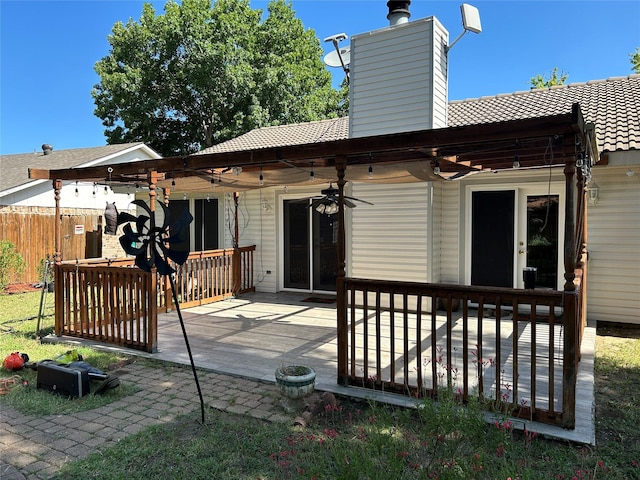 216 Lemon Dr, Arlington, TX 76018 - back of property featuring a patio area, a ceiling fan, a tiled roof, and a chimney