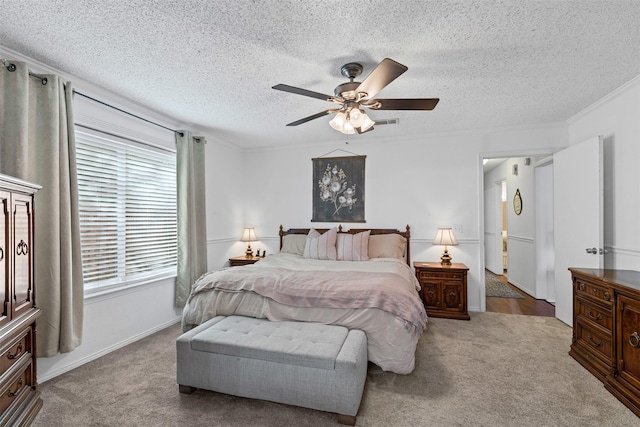 6737 Oliver Dr, North Richland Hills, TX 76180 - bedroom with carpet flooring, a textured ceiling, and a ceiling fan