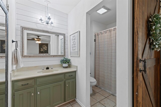 6737 Oliver Dr, North Richland Hills, TX 76180 - bathroom featuring tile patterned flooring, vanity, a ceiling fan, a chandelier, and curtained shower