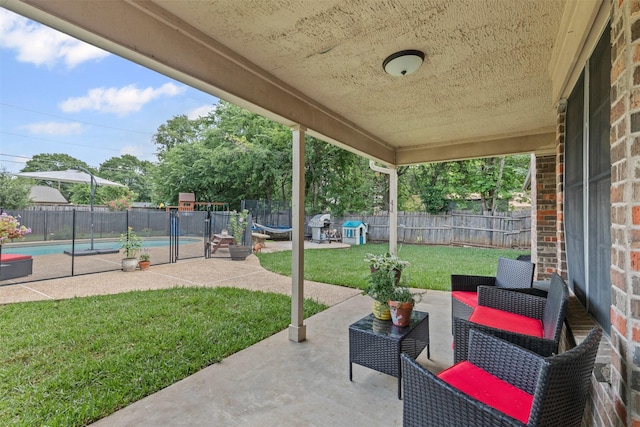 6737 Oliver Dr, North Richland Hills, TX 76180 - fenced backyard featuring a trampoline and a patio