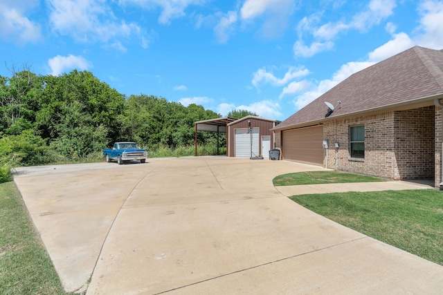 210 Walker Ct N, Waxahachie, TX 75167 - view of side of property featuring brick siding, driveway, roof with shingles, and an outbuilding