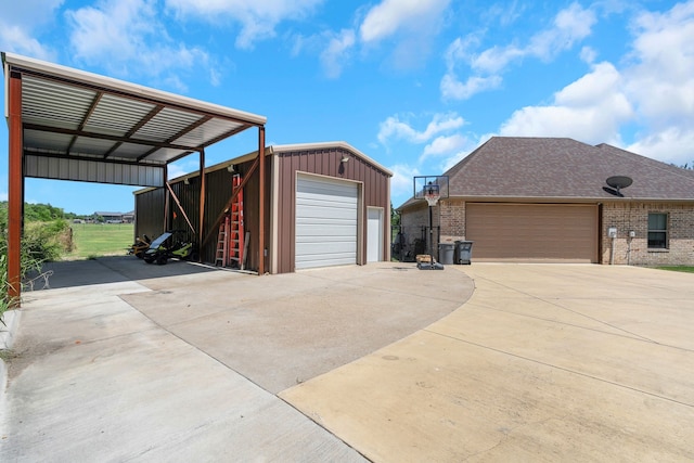 210 Walker Ct N, Waxahachie, TX 75167 - garage with driveway and a detached garage