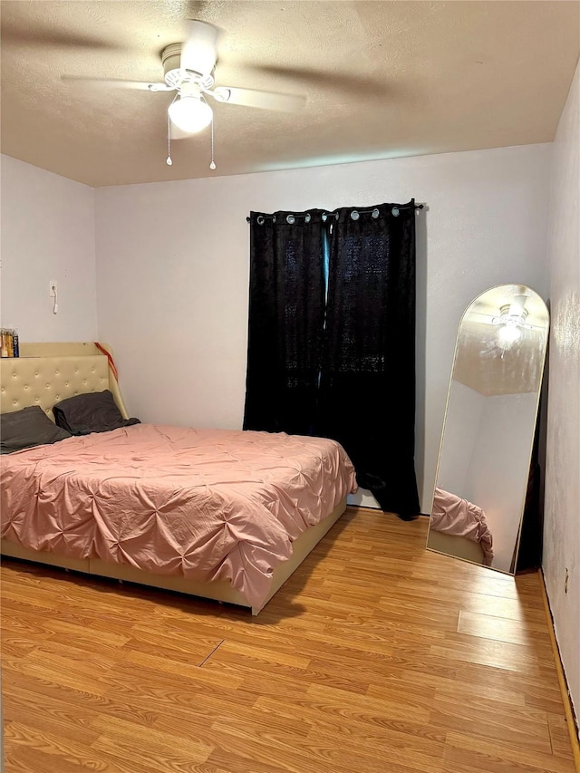 1125 Siebold Ct, Mesquite, TX 75150 - bedroom featuring light wood-type flooring and ceiling fan