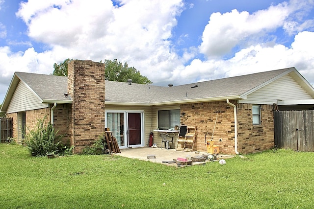 1125 Siebold Ct, Mesquite, TX 75150 - back of house featuring brick siding, a patio area, a chimney, and a shingled roof
