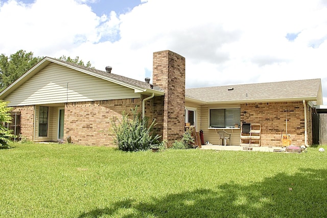 1125 Siebold Ct, Mesquite, TX 75150 - back of house featuring a chimney, brick siding, a yard, and a shingled roof