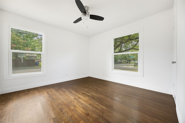 2267 Tealford Dr, Dallas, TX 75228 - spare room featuring dark wood-style flooring and ceiling fan