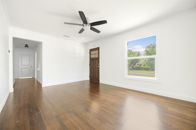 2267 Tealford Dr, Dallas, TX 75228 - unfurnished room featuring dark wood-style flooring, a ceiling fan, and crown molding