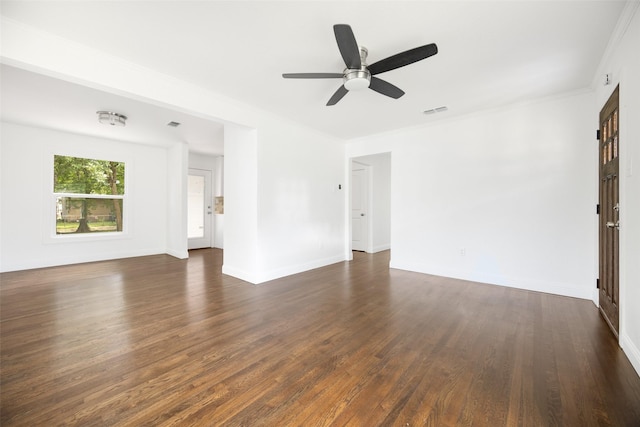 2267 Tealford Dr, Dallas, TX 75228 - unfurnished living room featuring dark wood-type flooring, ceiling fan, and ornamental molding