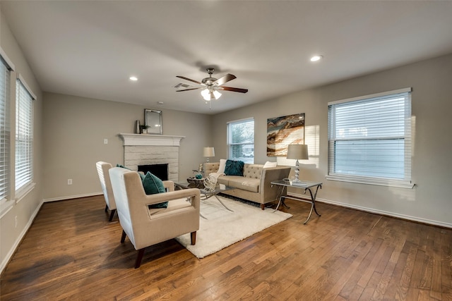 4053 Winfield Ave, Fort Worth, TX 76109 - living room featuring wood finished floors, ceiling fan, a stone fireplace, and recessed lighting