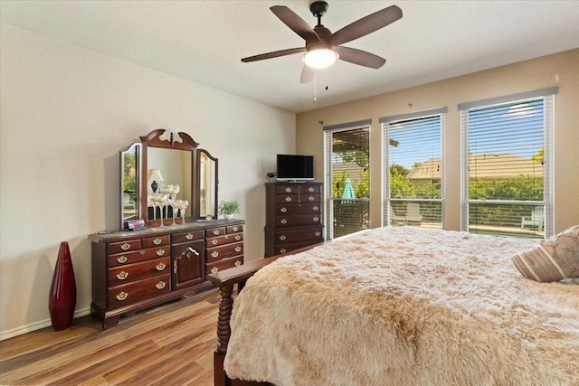 6321 Cobblestone Ln, Arlington, TX 76001 - bedroom featuring wood finished floors and a ceiling fan