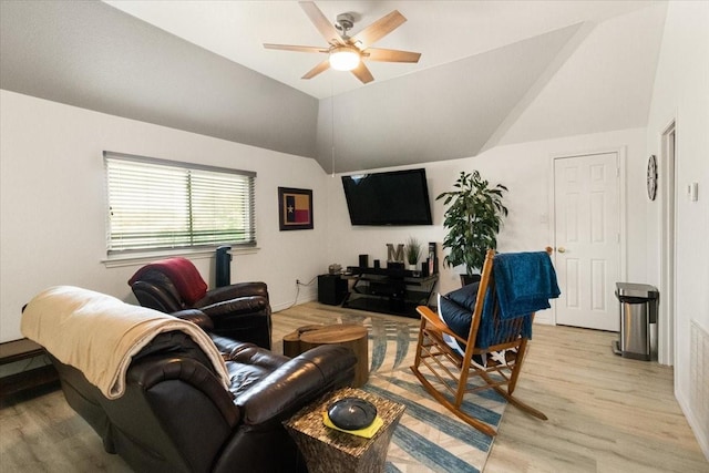 6321 Cobblestone Ln, Arlington, TX 76001 - living room featuring a ceiling fan, light wood finished floors, and vaulted ceiling