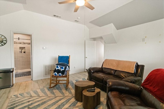 6321 Cobblestone Ln, Arlington, TX 76001 - living area featuring light wood-style flooring, ceiling fan, and lofted ceiling