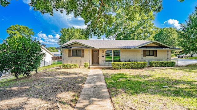 1031 Oak Hurst Dr, Grapevine, TX 76051 - view of front facade with a porch and brick siding