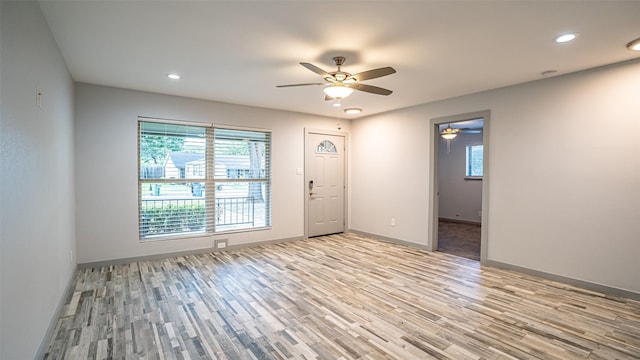 1031 Oak Hurst Dr, Grapevine, TX 76051 - unfurnished room featuring light wood-style flooring, plenty of natural light, ceiling fan, and recessed lighting